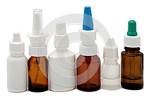 Bottles with and spray nasal drops isolated on