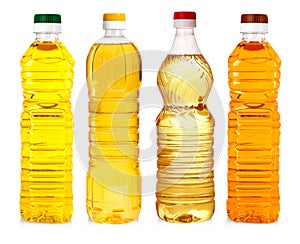 Bottles of sunflower oil isolated on white background.