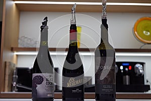 3 bottles of wine on display
