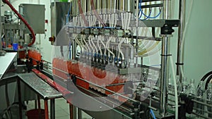 Bottling of lemonade in plastic bottles. Lemonade bottle conveyor industry