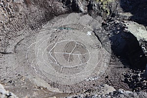 The bottom of the Active crater of Gorely volcano with a dried up, covered with ice acid lake, Kamchatka Peninsula