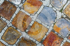 Bottom floor formed by hydraulic and stone tiles, with square shape