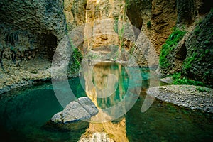 At the bottom of La Casa Del Rey Moro, Ronda, Spain canyon gorge