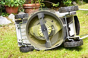 Bottom lawnmower in a garden