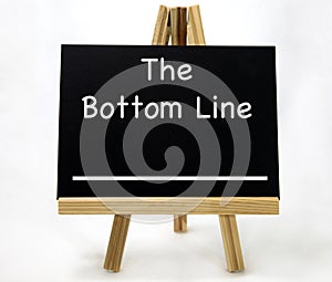 The BOTTOM LINE Concept Visual Pun photo