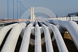 Bottom shot of a pipeline at sunset. Pipeline transportation is most common way of transporting goods such as Oil, natural gas or photo