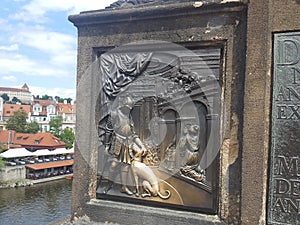 The bottom of the statue of St. John of Nepomuk located on the famous Charles Bridge