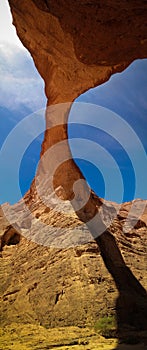 Bottom up view Abstract Rock formation at plateau Ennedi aka Aloba arch in Chad