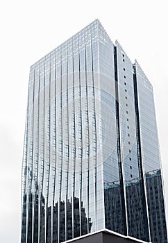 Bottom up view modern tower glass building