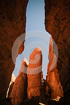 Bottom-up view to Abstract Rock formation at plateau Ennedi aka stone forest in Chad