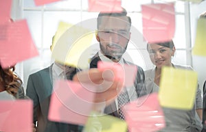 Bottom view.businessman reading notes on the table