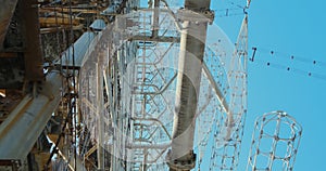 Bottom view, Chernobyl 2 radio antenna, military facility, giant mettal radar. Ukraine, daytime.