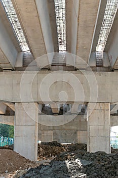 bottom view of concrete highway under construction at vertical composition