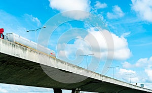 Bottom view of elevated concrete highway. Overpass concrete road. Road flyover structure. Modern motorway. Transportation