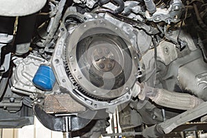 Bottom view of the engine compartment of a car with the gearbox removed