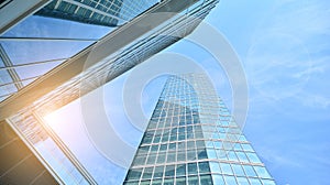 Bottom view of glass silhouette of skyscraper. Business building.