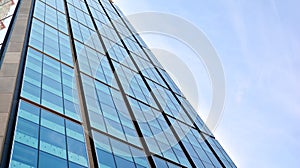 Bottom view of glass silhouette of skyscraper. Business building.