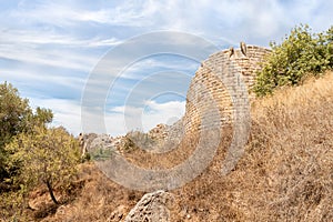 Bottom view of a hill with the ruins of a round watchtower of the medieval fortress of Nimrod - Qalaat al-Subeiba, located near