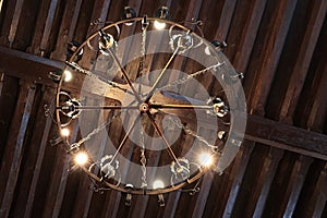 Bottom view of historical large brass chandelier installed in nobility mansion in northern Slovakia during 19th century