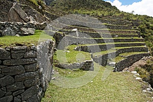 Bottom view of the Inca archaeological complex and its terraces of Machu Picchu in the Peruvian Andes, Peru