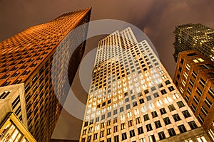 Bottom view of modern Skyscrapers at night. Ministry of Foreign Affairs in Hague, Netherlands