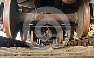 Bottom view of old railway train. Under the train view