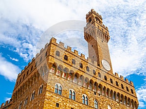 Bottom view of Pallazo Vecchio, Old Palace - Town Hall, with high bell tower, Piazza della Signoria, Florence, Tuscany