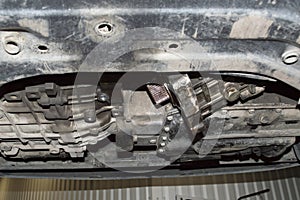 Bottom view of the partially removed transfer case