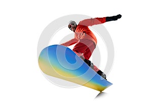 Bottom view. Portrait of active man, snowboarder in uniform riding on snowboard isolated over white studio background