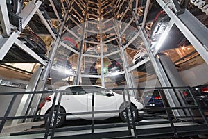 Bottom view of a white car on parking