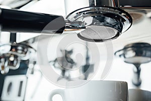 Bottomless portafilter in the coffee machine photo
