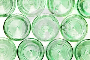 Bottoms of empty glass bottles isolated on white