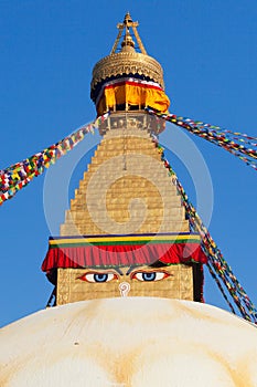 Boudha, bodhnath or Boudhanath stupa with prayer flags, the biggest buddhist stupa in Kathmandu city - buddhism in Nepal