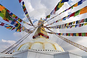 Boudhanath Stupa in Kathmandu and buddhist prayer flags