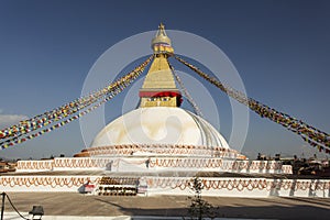 Boudhanath stupa in Kathmandu, Nepal. The Buddhist stupa of Boudhanath dominates the skyline, it is one of the largest stupas in photo