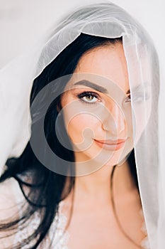 Boudoir portrait of beautiful bride. Bride wedding morning