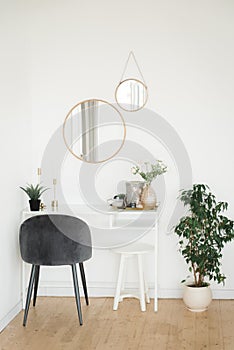 Boudoir table with a mirror and a chair. Hugge. Furniture. photo