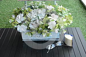 Bouguet of flowers in a vase on wooden table bouguet of flowers