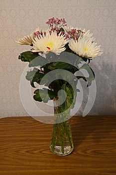 Bouguet of white chrysanthemums on the table