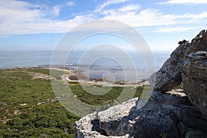 Boulder formation with fynbos vegetation and shoreline