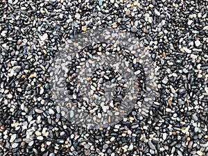 boulder pebble beach stones background seamless texture for design use