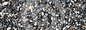 boulder pebble beach stones background seamless texture for design use