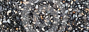 boulder pebble beach stones background seamless texture for design use