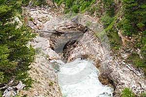 Boulder River flowing through rocky chasm in Montana