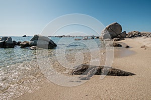 Boulders on beach at Cavallo Island in Corsica