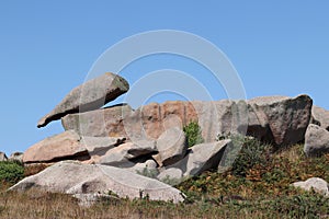 Boulders on the Cote de Granit Rose in Brittany, France photo