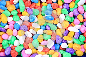 boulders with plastic colors as background