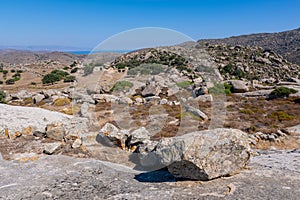 Boulders scattered throughout the terrain of Volax in Tinos