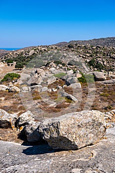 Boulders scattered throughout the terrain of Volax in Tinos