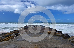 Boulders serve as a breakwall to protect Kings beach